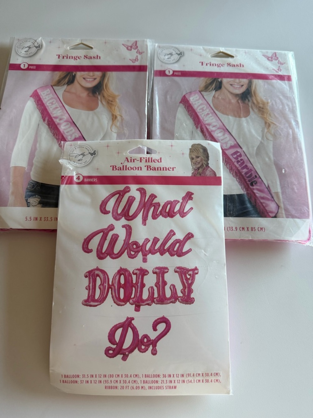 Dolly Parton “What Would Dolly Do?” Pink Air Filled Balloon Banner 2 Fringe Sash